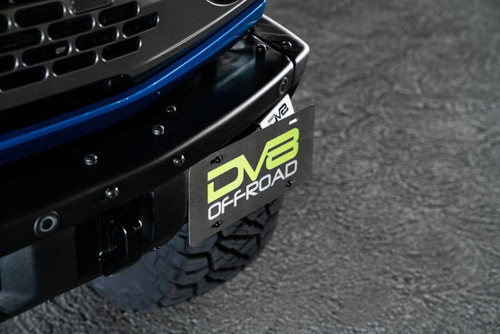 DV8 Offroad 21-22 Ford Bronco Factory Front Bumper License Relocation Bracket - Side - Bull Strap
