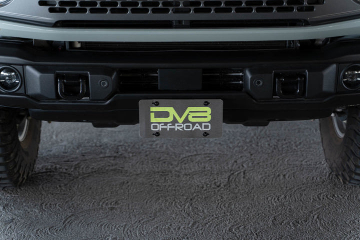 DV8 Offroad 21-23 Ford Bronco Capable Bumper Front License Plate Mount - Bull Strap