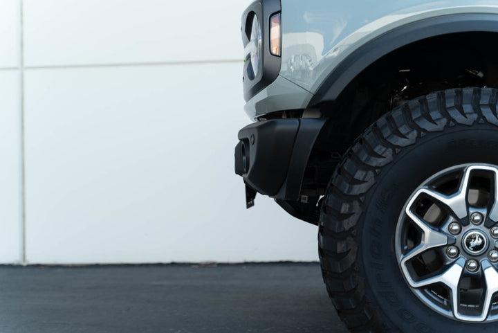 DV8 Offroad 21-23 Ford Bronco Capable Bumper Front License Plate Mount - Bull Strap
