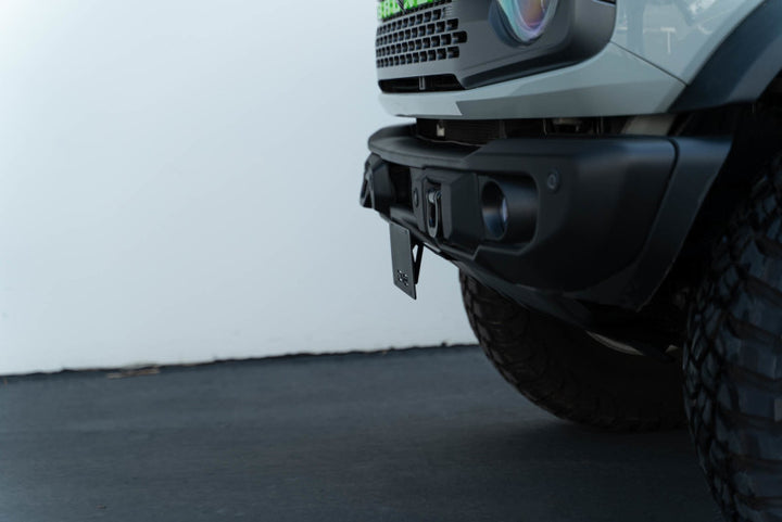 DV8 Offroad 21-23 Ford Bronco Capable Bumper Front License Plate Mount - Bull Strap