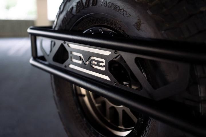 DV8 Offroad 21-23 Ford Bronco Spare Tire Guard & Accessory Mount - Bull Strap