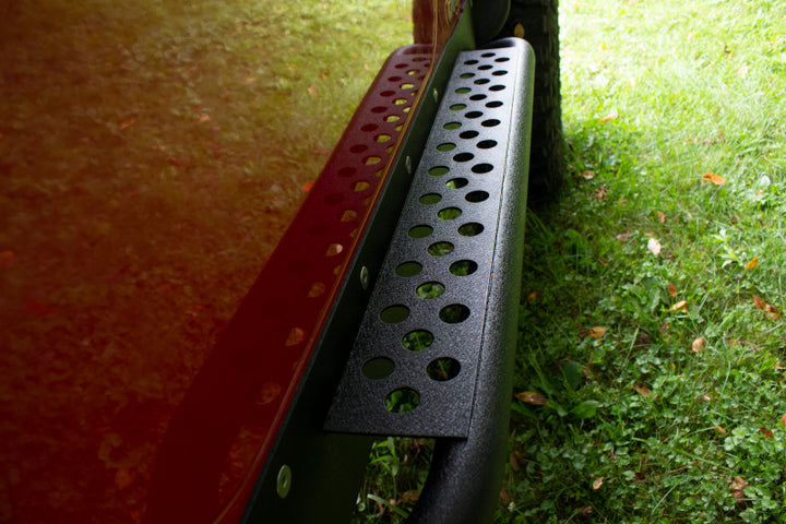 Fishbone Offroad 97-06 Jeep Wrangler TJ Steel Rock Slider - Black Textured Powdercoat - Bull Strap