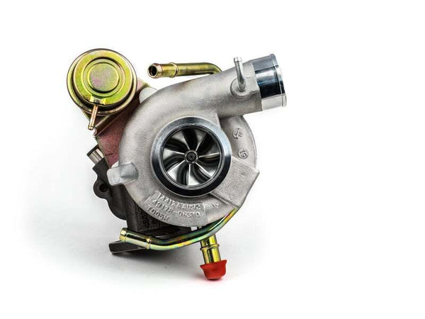 Forced Performance Subaru STi/WRX Blue Turbocharger 58mm CH8 CM Turbine Hsg Internal WG w/Oil Line - Bull Strap