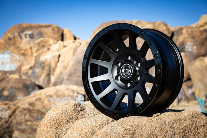 ICON Compression 18x9 6x5.5 0mm Offset 5in BS 106.1mm Bore Double Black Wheel - Bull Strap