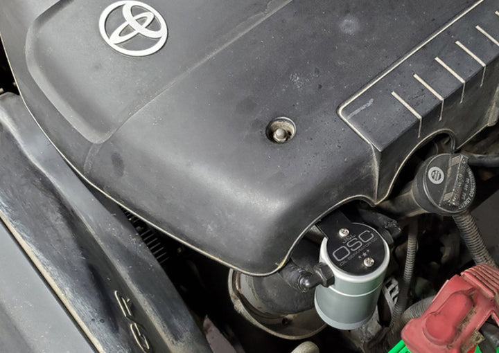 J&L 05-24 Toyota 4Runner 4.0L Driver Side Oil Separator 3.0 - Clear Anodized - Bull Strap