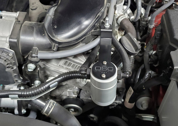 J&L 05-24 Toyota 4Runner 4.0L Driver Side Oil Separator 3.0 - Clear Anodized - Bull Strap