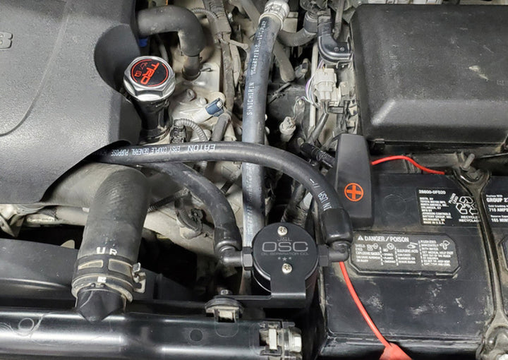 J&L 07-21 Toyota Tundra 5.7L Driver Side Oil Separator 3.0 - Black Anodized - Bull Strap