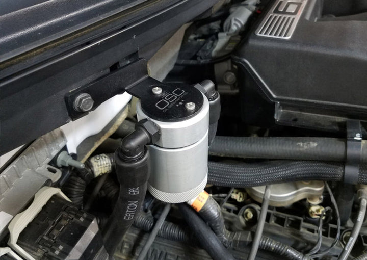 J&L 11-14 Ford F-150/Ford F-150 Raptor 6.2L Passenger Side Oil Separator 3.0 - Clear Anodized - Bull Strap