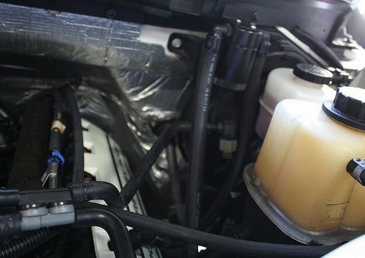J&L 11-17 Ford F-150 5.0L / 11-14 Ford F-150 6.2L Driver Side Oil Separator 3.0- Black Anodized - Bull Strap