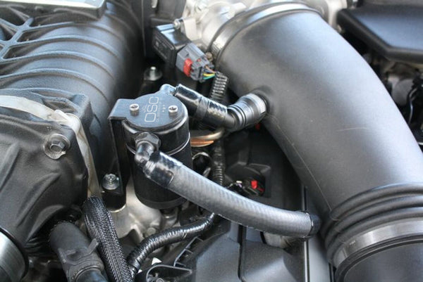 J&L 11-17 Ford Mustang GT (w/Roush/VMP Supercharger) Driver Side Oil Separator 3.0 - Black Anodized - Bull Strap