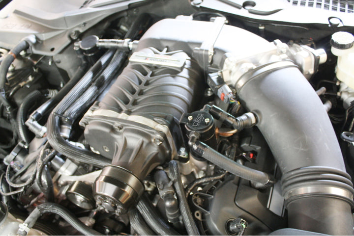 J&L 11-17 Ford Mustang GT (w/Roush/VMP Supercharger) Driver Side Oil Separator 3.0 - Black Anodized - Bull Strap