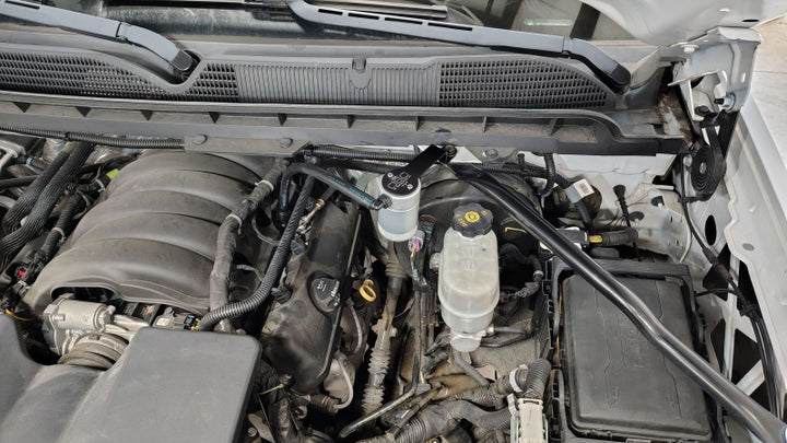 J&L 14-18 Chevy Silverado 1500 / 14-18 GMC Sierra 1500 4.3L V6 Oil Separator - Clear Anodized - Bull Strap