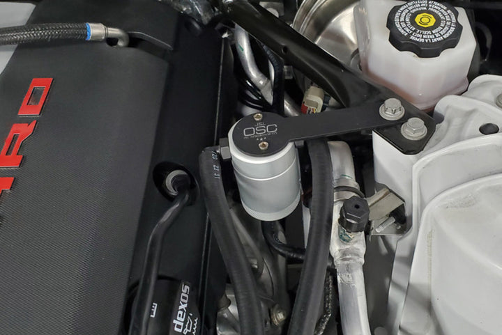 J&L 16-24 Chevrolet Camaro LT1 6.2L Drivers Side Oil Separator 3.0 - Clear Anodized - Bull Strap