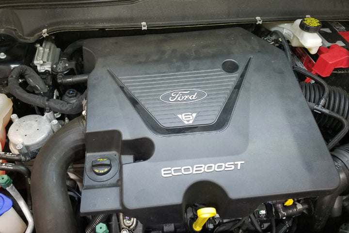 J&L 17-19 Ford Fusion Sport 2.7L Passenger Side Oil Separator 3.0 - Black Anodized - Bull Strap