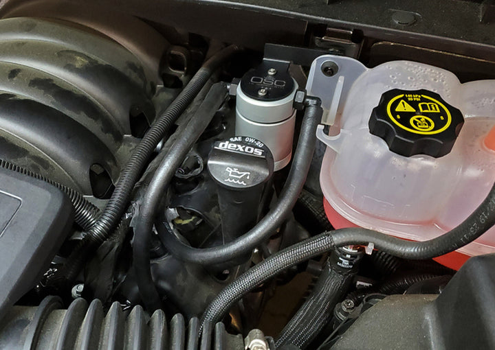 J&amp;L 19-26 Chevrolet Silverado/GMC Sierra 1500 5.3L V8 Driver Side Oil Separator 3.0 - Clear Anod - Bull Strap