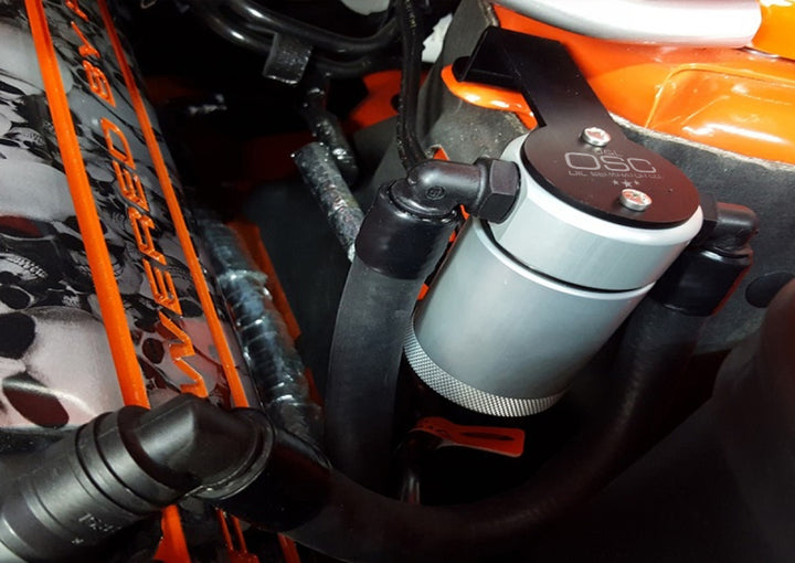 J&L 2011-2017 Ford Mustang GT Driver Side Oil Separator 3.0 - Clear Anodized - Bull Strap