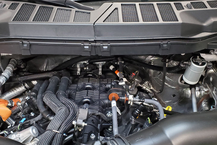 J&L 2021-2025 Ford F-150 3.5L Passenger Side Oil Separator 3.0 - Clear Anodized - Bull Strap