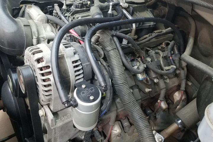 J&L 97-13 Chevy/GM Truck/SUV 4.8L/5.3L/6.0L/6.2L Driver Side Oil Separator 3.0 - Clear Anodized - Bull Strap