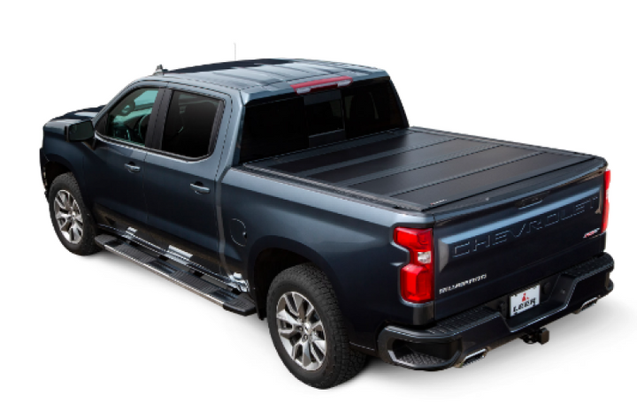 LEER 2019+ GM Silverado/Sierra HF650M 5Ft8In Tonneau Cover - Folding - Bull Strap