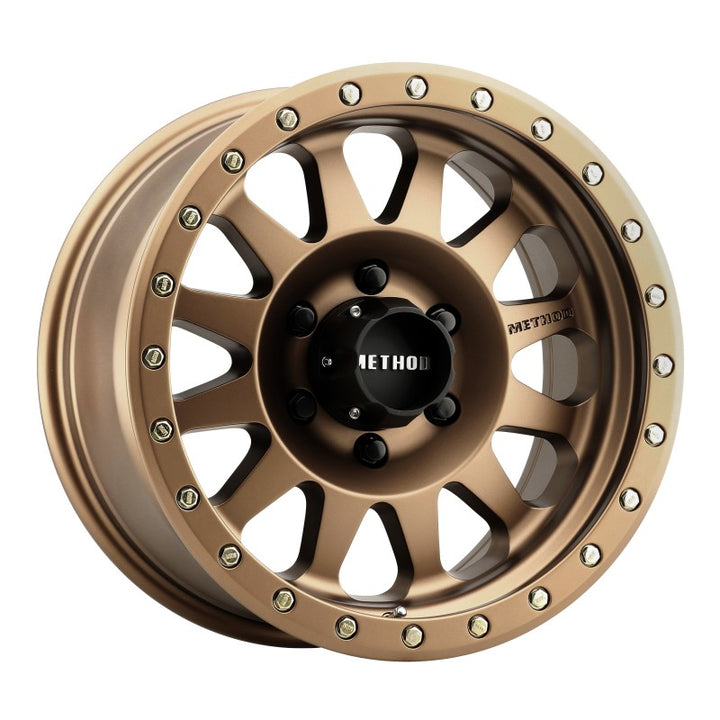Method MR304 Double Standard 17x8.5 0mm Offset 6x5.5 108mm CB Method Bronze Wheel - Bull Strap