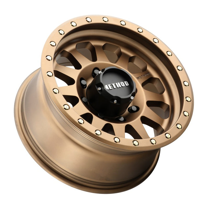 Method MR304 Double Standard 17x8.5 0mm Offset 8x6.5 130.81mm CB Method Bronze Wheel - Bull Strap