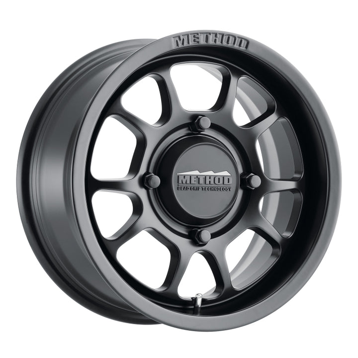 Method MR409 Bead Grip 15x7 / 5+2/38mm Offset / 4x136 / 106.25mm CB Matte Black Wheel - Bull Strap