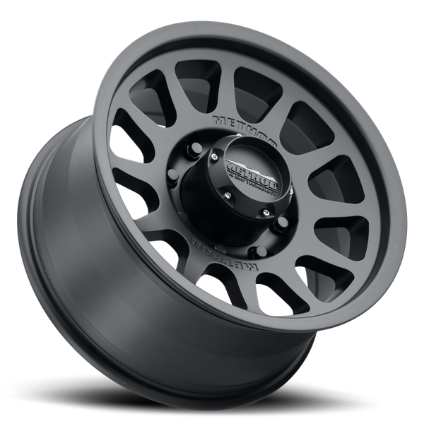 Method MR703 17x8.5 0mm Offset 8x6.5 130.81mm CB Matte Black Wheel - Bull Strap