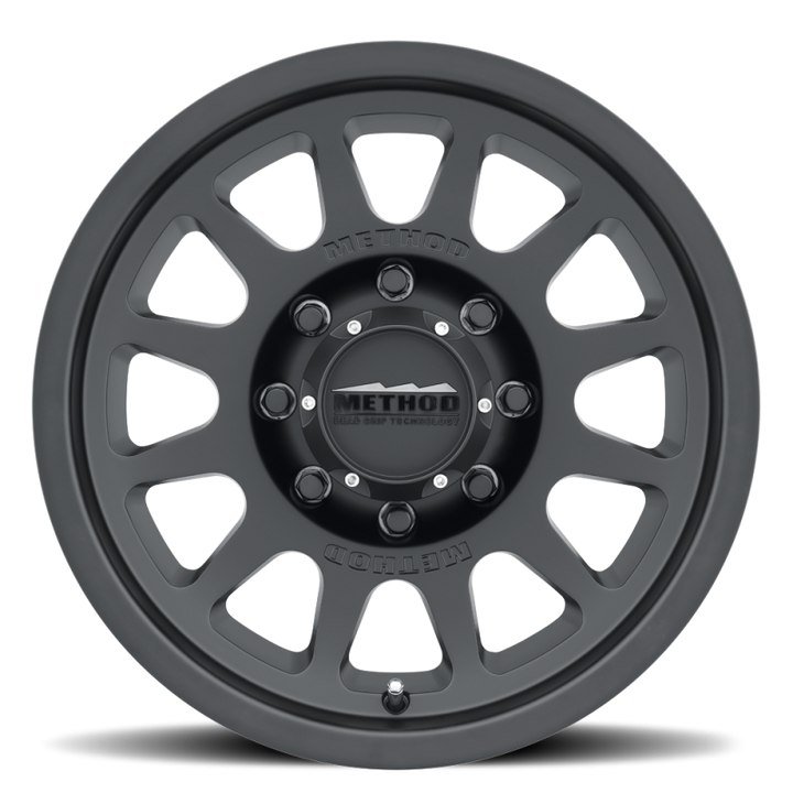 Method MR703 17x8.5 0mm Offset 8x6.5 130.81mm CB Matte Black Wheel - Bull Strap