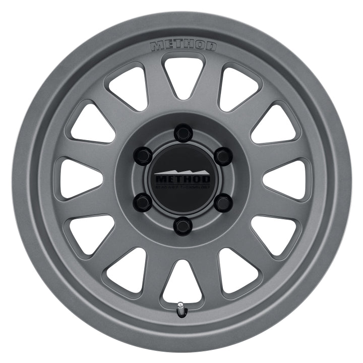 Method MR704 17x8.5 0mm Offset 6x5.5 106.25mm CB Matte Titanium Wheel - Bull Strap