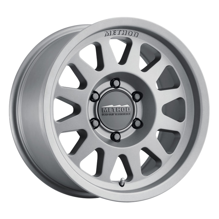 Method MR704 17x8.5 0mm Offset 6x5.5 106.25mm CB Matte Titanium Wheel - Bull Strap