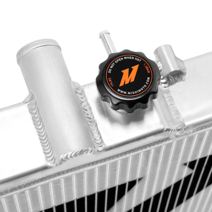 Mishimoto 03-07 Mitsubishi Lancer Evo Manual Aluminum Radiator - Bull Strap