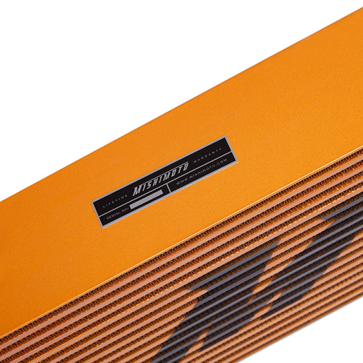 Mishimoto Universal Gold R Line Intercooler Overall Size: 31x12x4 Core Size: 24x12x4 Inlet / Outlet - Bull Strap