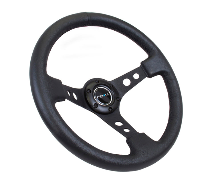NRG Reinforced Steering Wheel (350mm / 3in. Deep) Blk Leather w/Blk Spoke & Circle Cutouts - Bull Strap