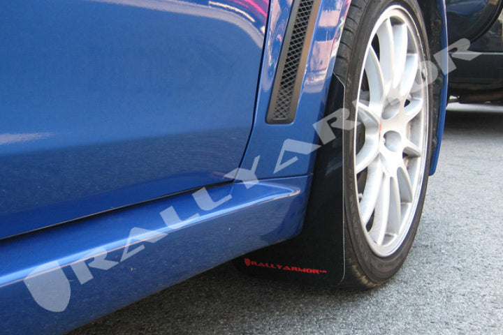 Rally Armor 08-17 Mitsubishi EVO X Black UR Mud Flap w/ Red Logo - Bull Strap