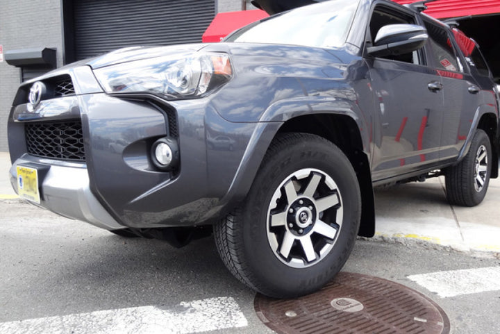 Rally Armor 12-24 Toyota 4Runner Black UR Mud Flap w/Red Logo - Bull Strap