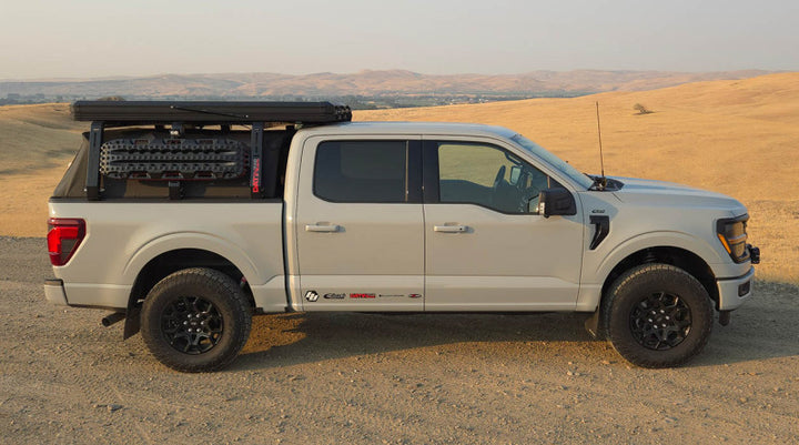 Rally Armor 21-25 Ford F-150 (Excl. Raptor) Black UR Mud Flap w/Metallic Black Logo - Bull Strap