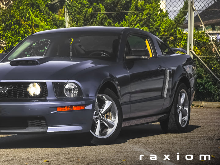 Raxiom 05-09 Ford Mustang Directional Sideview Mirrors - Bull Strap