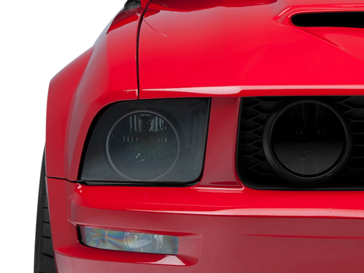 Raxiom 05-09 Ford Mustang GT V6 Axial Series CCFL Halo Projector Headlight- Blk Housing (Smkd Lens) - Bull Strap