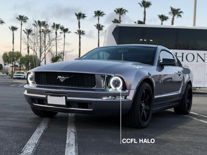 Raxiom 05-09 Ford Mustang GT V6 Axial Series CCFL Halo Projector Headlight- Blk Housing (Smkd Lens) - Bull Strap