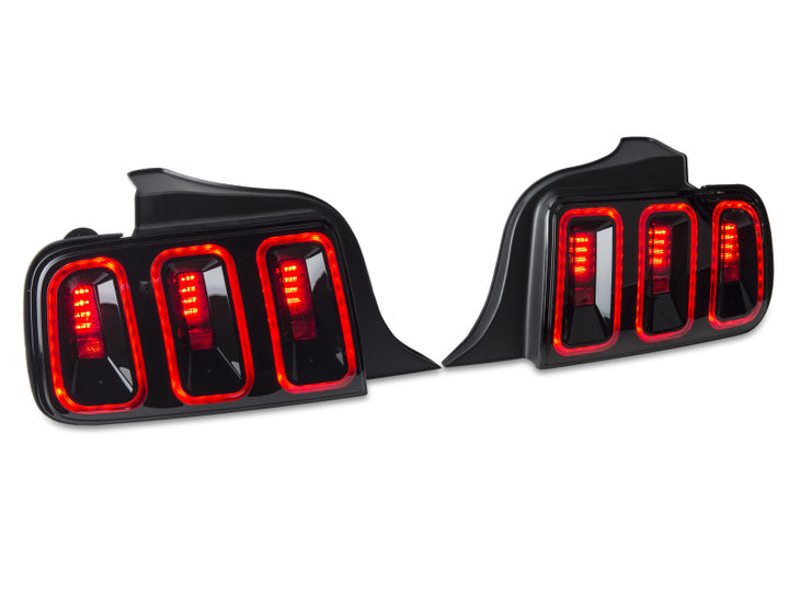 Raxiom 05-09 Ford Mustang Gen5 Tail Lights- Black Housing (Smoked Lens) - Bull Strap