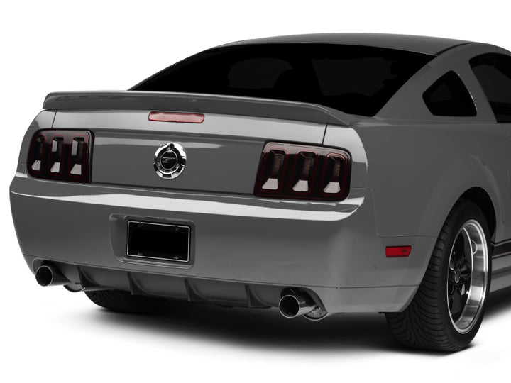 Raxiom 05-09 Ford Mustang Gen5 Tail Lights- Black Housing (Smoked Lens) - Bull Strap