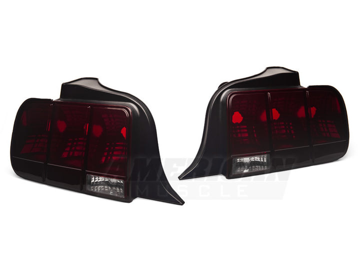 Raxiom 05-09 Ford Mustang Tail Lights- Black Housing (Smoked Lens) - Bull Strap