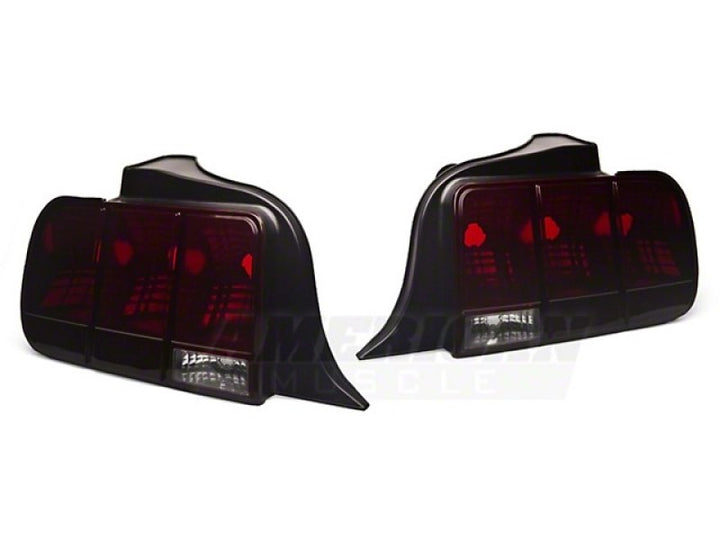 Raxiom 05-09 Ford Mustang Tail Lights- Black Housing (Smoked Lens) - Bull Strap
