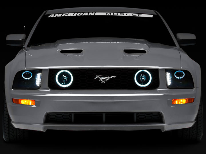 Raxiom 05-09 Ford Mustang w/ Halogen LED Halo Prjctr Headlights-Blk Hsng(Smoked Lens Exclude GT500) - Bull Strap