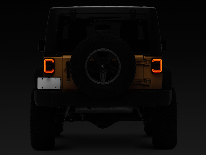 Raxiom 07-18 Jeep Wrangler JK Axial Series LED Halo Tail Lights- Black Housing (Dark Smoked Lens) - Bull Strap