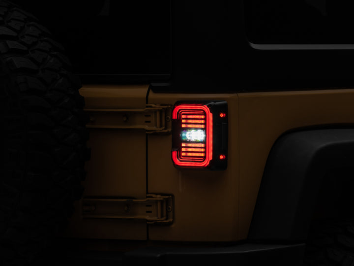 Raxiom 07-18 Jeep Wrangler JK Axial Series LED Halo Tail Lights- Black Housing (Dark Smoked Lens) - Bull Strap