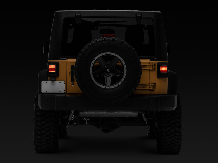 Raxiom 07-18 Jeep Wrangler JK LED Tail Lights- Black Housing (Smoked Lens) - Bull Strap