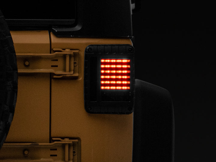 Raxiom 07-18 Jeep Wrangler JK LED Tail Lights- Black Housing (Smoked Lens) - Bull Strap