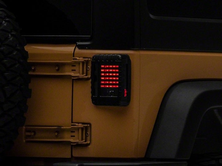 Raxiom 07-18 Jeep Wrangler JK LED Tail Lights- Black Housing (Smoked Lens) - Bull Strap