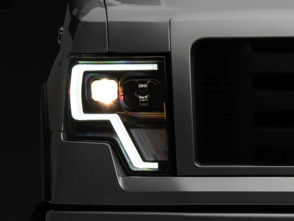 Raxiom 09-14 Ford F-150 G4 Projector Headlights- Black Housing (Clear Lens) - Bull Strap